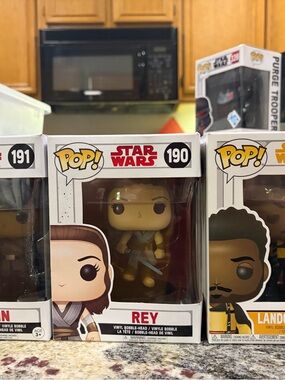 Funko Pop! Star Wars Rey Figure - Brown, Tan, Blue